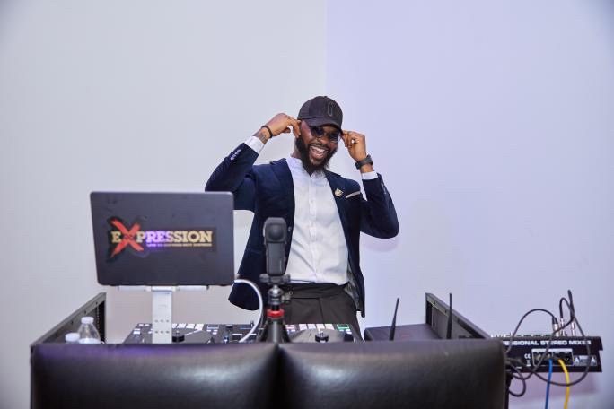 DJ Expression on the mic with full speaker stacks